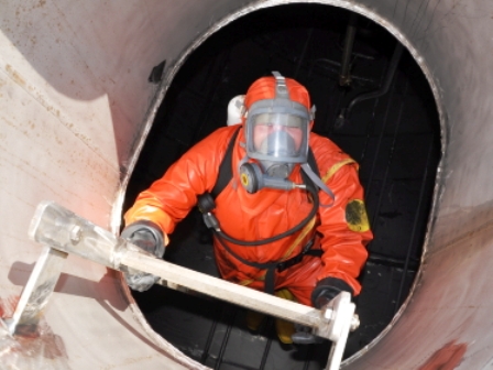 worker entering storage tank.jpg